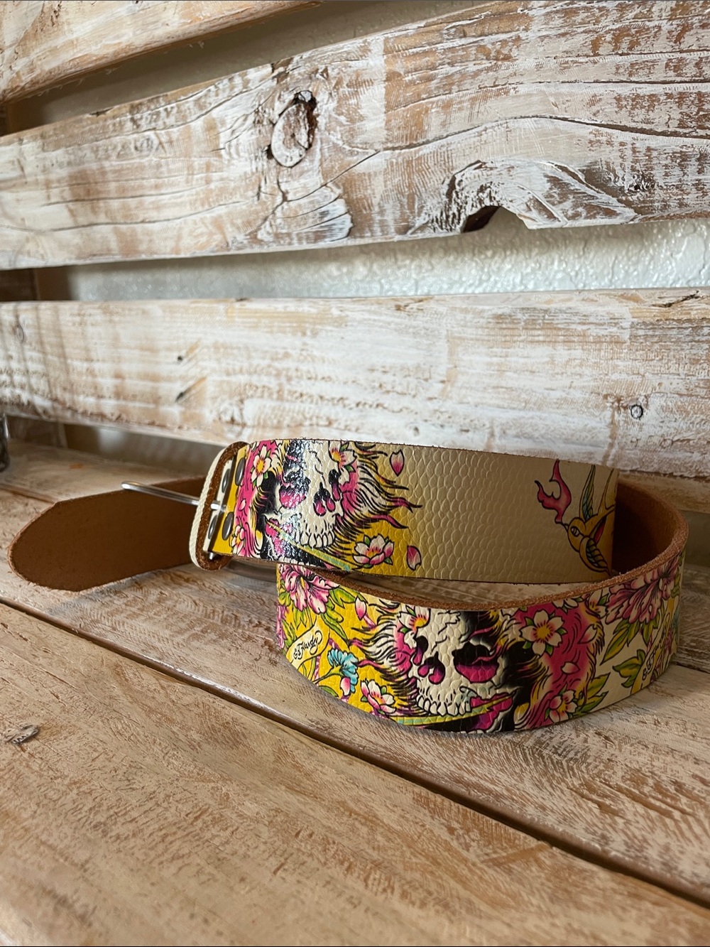 Size Small Ed Hardy belt features iconic tattoo-inspired skulls and flowers
